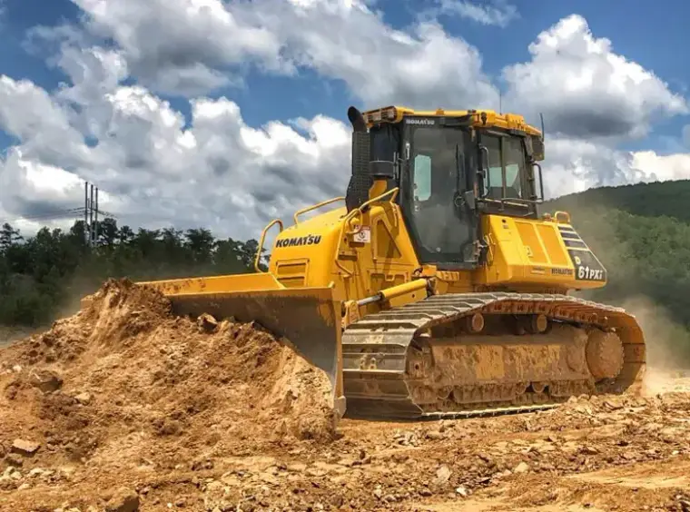Komatsu D61PXi dozer pushing earth on a job site